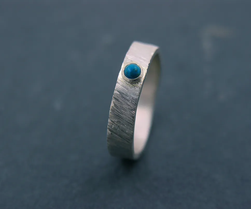 Bague de fiançaille en argent sertie d'une turquoise